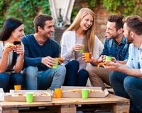 As part of your plan for how to start a running club, host monthly social gatherings.