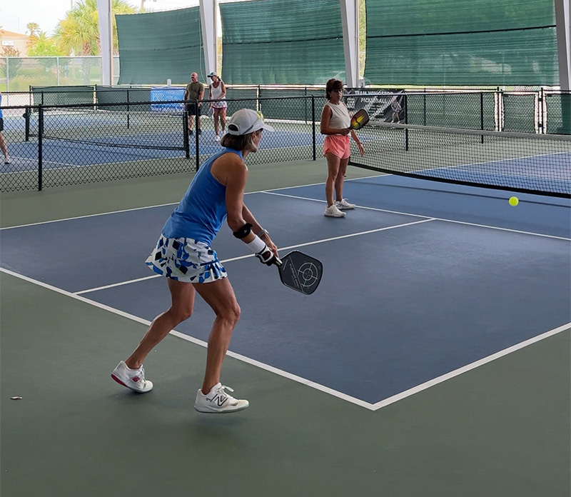Women playing pickleball