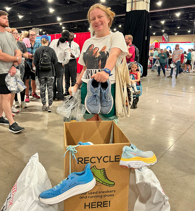 Woman donating show at Marine Corps Marathon