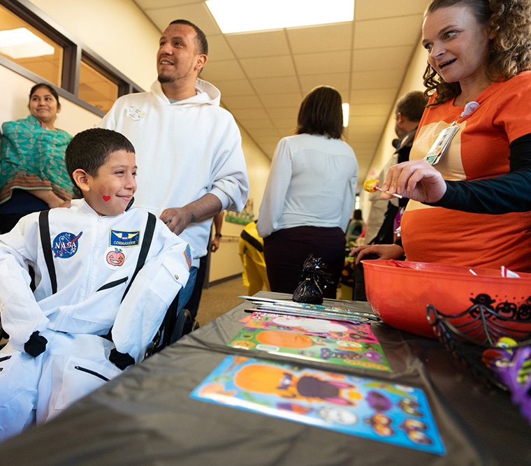 healthcare heros child in astronaut suit