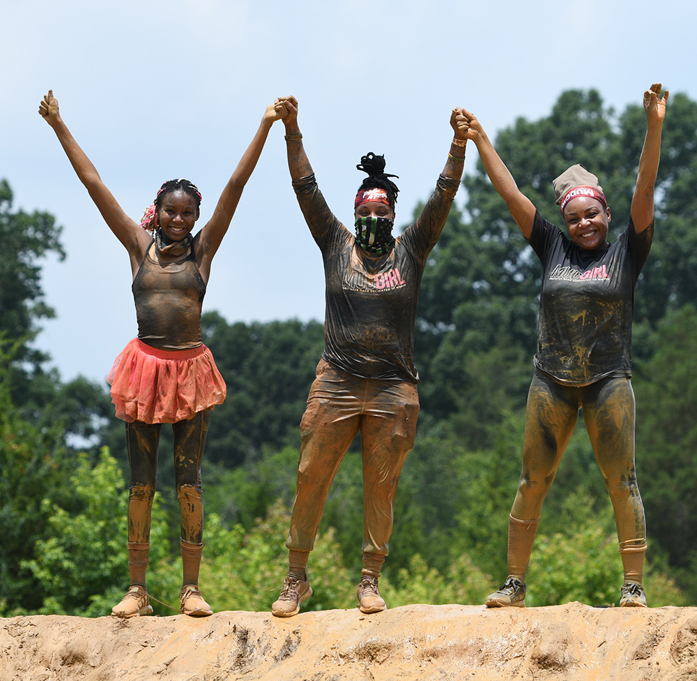 Mudgirls celebrating
