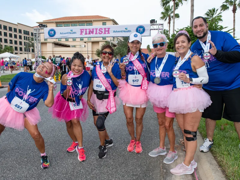 Pink on Parade 5k runners show off their tutus and support breast cancer awareness at the race.