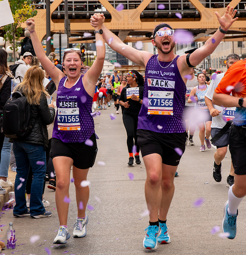 Two Runners celebrating a successful finish at the 2024 Chicago Marathon.