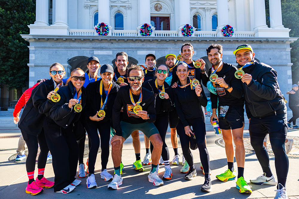 Beautiful morning in fall at the California International Marathon with Runners and their medals.