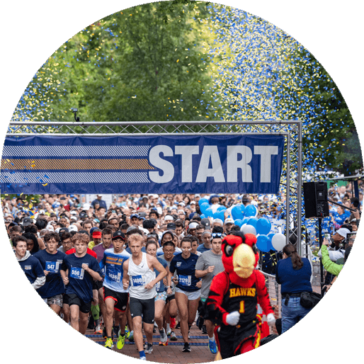 Winship Cancer Institue 5k runners use their Sneakers4Good with a sneaker collection at Emory.
