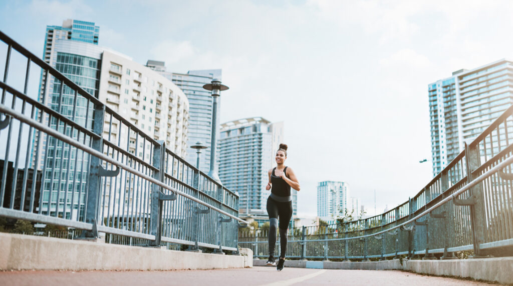 A woman running on a city street in Austin, Texas.